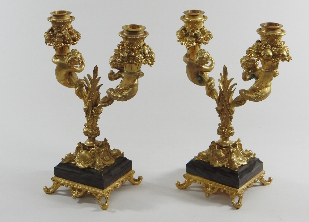 A pair of continental gilt bronze two branch table candelabra, decorated with fruit and putti, - Image 5 of 8