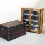 An early 20th century iron bound trunk, with a metal lined interior, 92cm,