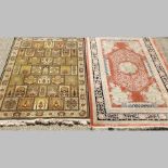 A keshan rug, with all over lozenges, on a gold ground, 200 x 143cm, together with another rug,