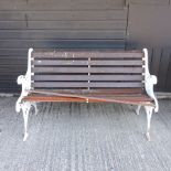 A white painted metal and slatted wooden garden bench,