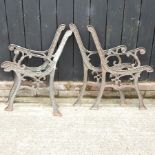 A pair of cast iron bench ends,