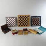 A collection of three chessboards,