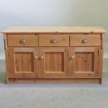 A modern pine dresser base,