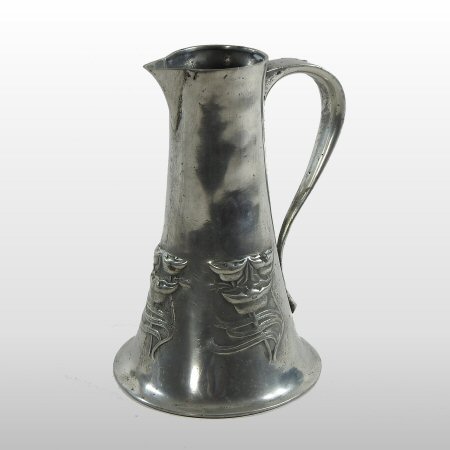 An Art Nouveau Tudric pewter jug, relief decorated with stylised flowers,