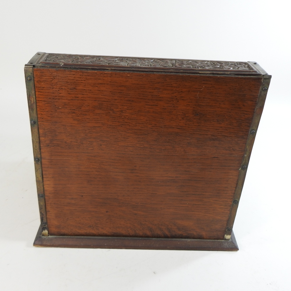 A 19th century carved oak and brass mounted tantalus, - Image 7 of 9