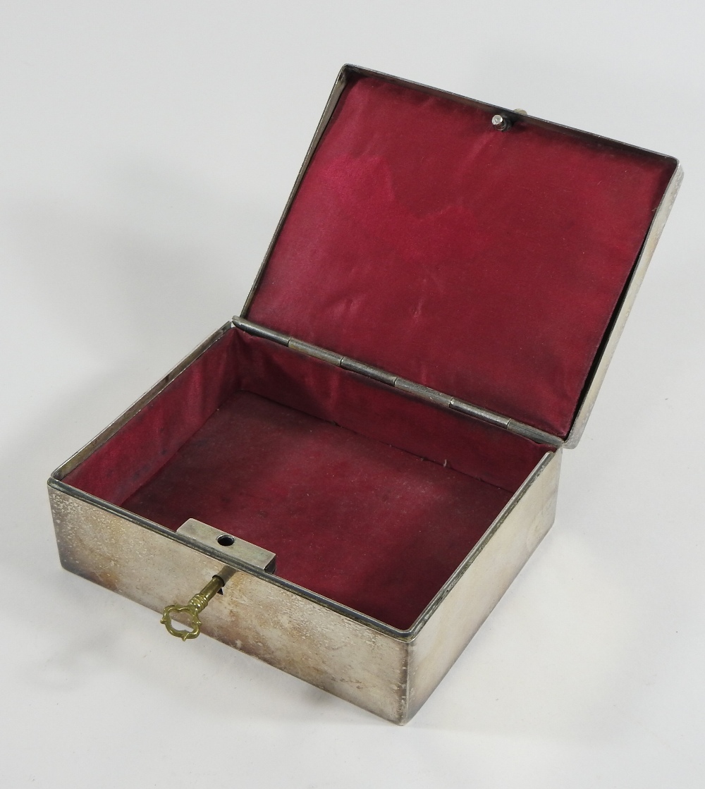 An early 20th century pewter box and cover, decorated in relief with a butterfly, - Image 4 of 6