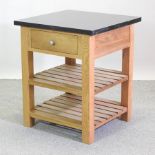 A light oak granite top kitchen island,