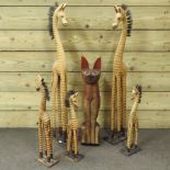 A collection of wooden animals, together with a collection of Mexican figures,