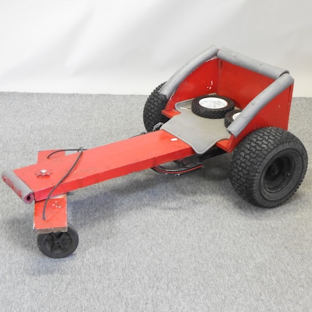 A red painted go-cart,