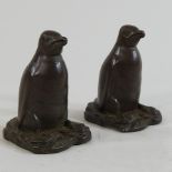 A pair of Chinese bronze figures of penguins,