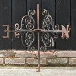 A wrought iron weather vane,