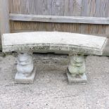 A reconstituted stone garden bench, standing on squirrel supports, 106cm,