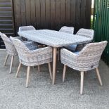 A grey rattan garden table, 180 x 95cm,