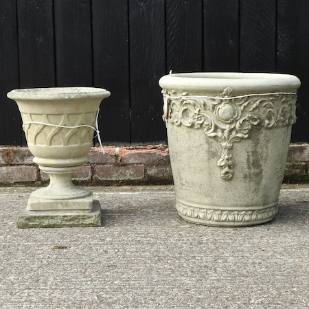 A circular stone planter, 47cm, together with a reconstituted stone urn,