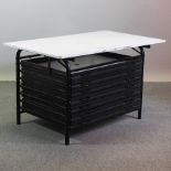 A modern black and white plan chest, with an adjustable top,