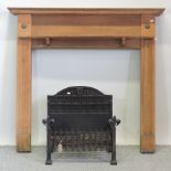 A 1920's oak fire surround, 136cm,