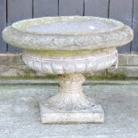 A reconstituted stone garden urn,