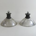 A pair of mid 20th century holophane style glass light shades,