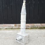 A lead garden water pump/hopper,