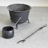 A black painted cauldron, 50cm diameter,
