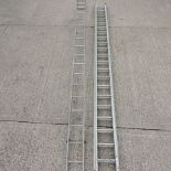 A large aluminium extending ladder, 550cm,