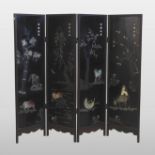 A Chinese hardwood and polished stone mounted folding dressing screen,