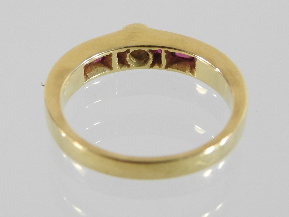 An 18 carat gold diamond ring, with channel set ruby shoulders, - Image 3 of 4