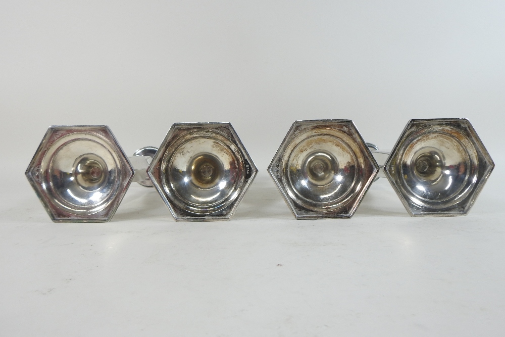 A set of four mid 20th century American silver plated table candlesticks, each of octagonal shape, - Image 9 of 9