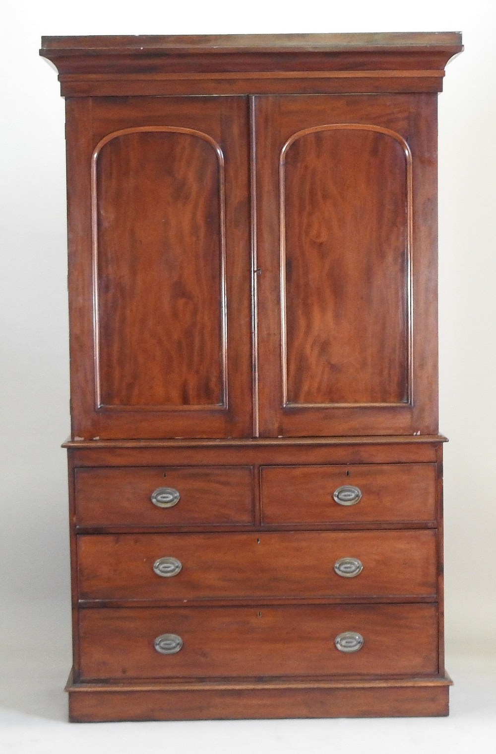 A 19th century mahogany linen press, fitted with slides, standing on a plinth base, - Image 4 of 12