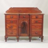 A Victorian mahogany sideboard, with a gallery back,