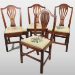 A set of four George III ash dining chairs, each having pierced splat, with an tapestry seat,