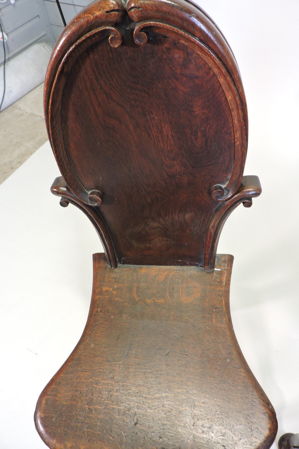 A pair of 19th century oak hall chairs, each with a shield shaped back and solid seat, - Image 7 of 7