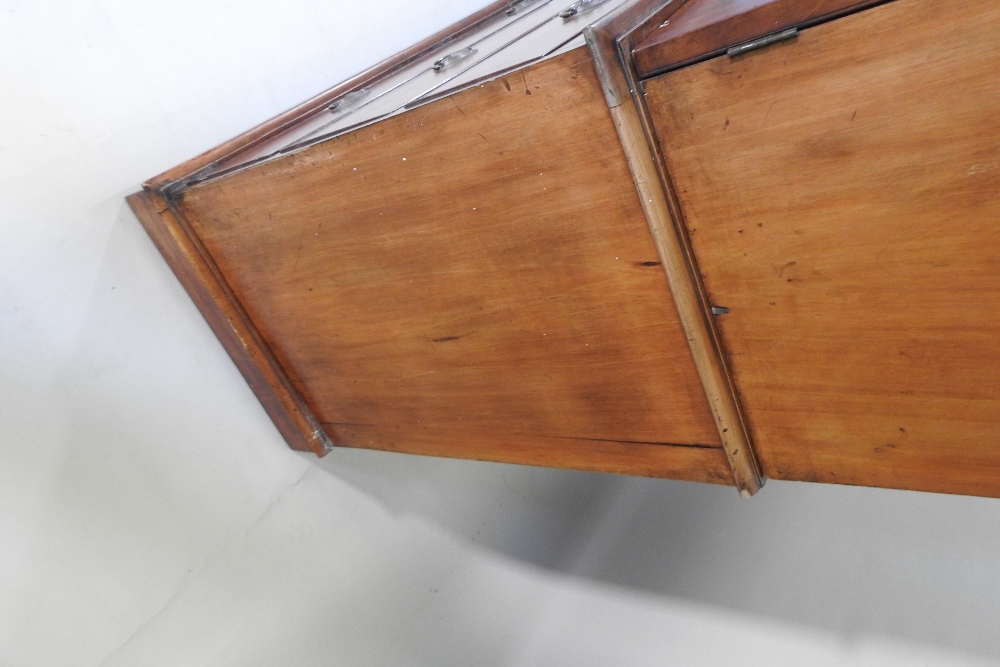 A 19th century mahogany linen press, fitted with slides, standing on a plinth base, - Image 8 of 12