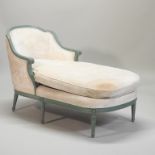 A French style cream upholstered and green painted day bed, on turned and reeded legs,