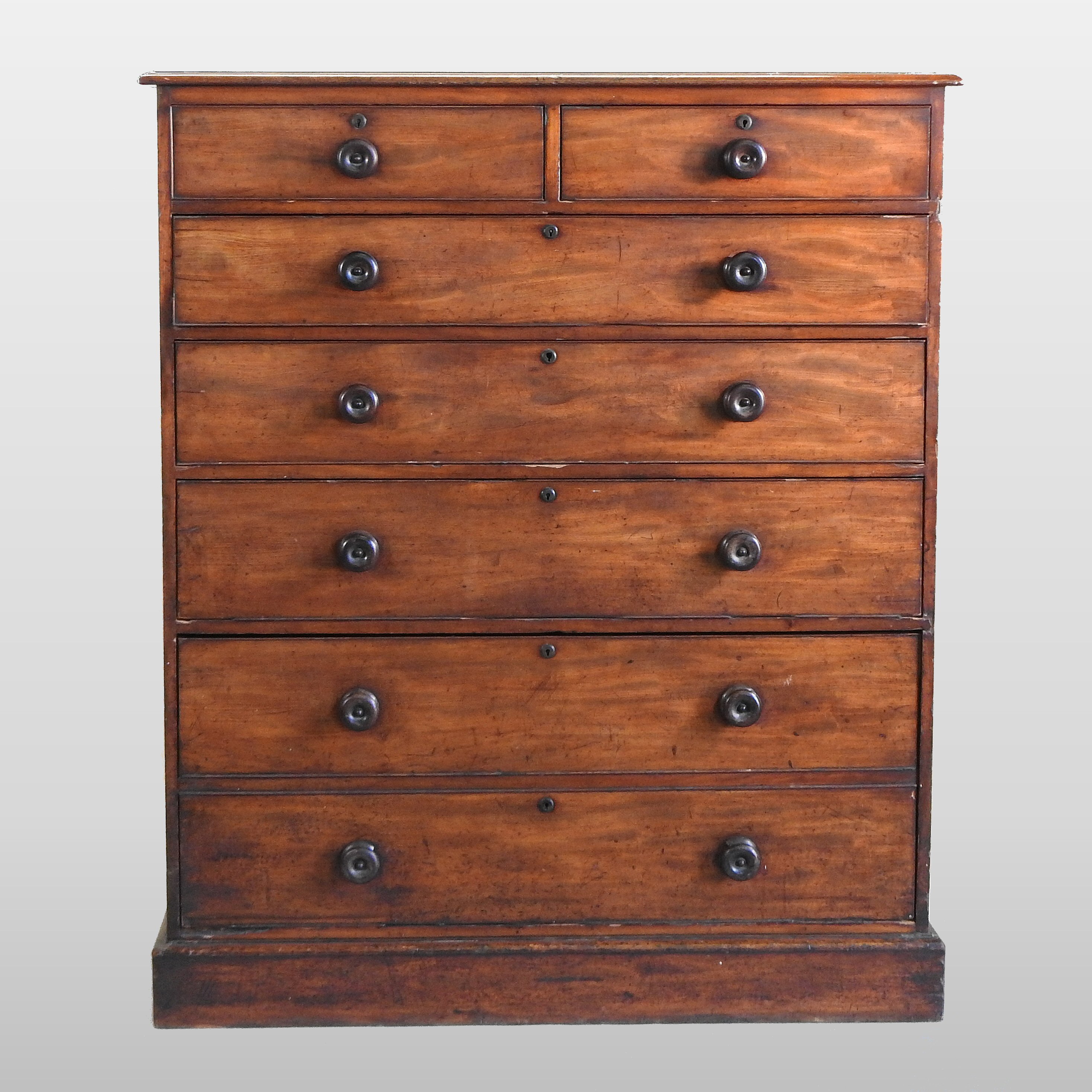 An early 19th century mahogany chest of drawers, of large proportions,