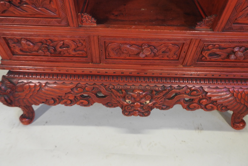 A Chinese red lacquered cabinet, - Image 2 of 14