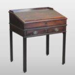 A George III mahogany clerk's desk, on square legs,