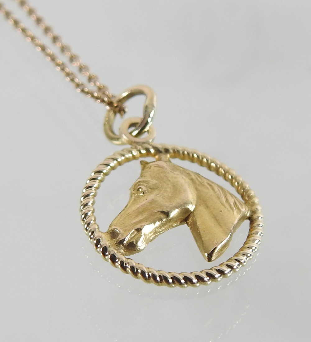 A 14 carat gold pendant, in the form of a horse's head, on an unmarked chain, - Image 5 of 7