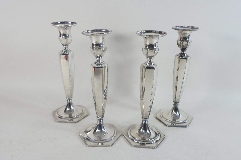 A set of four mid 20th century American silver plated table candlesticks, each of octagonal shape, - Image 7 of 9