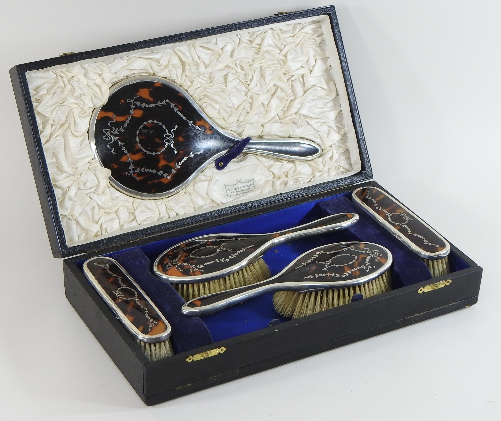 An early 20th century silver and tortoiseshell dressing table set, with pique work decoration, - Image 4 of 5