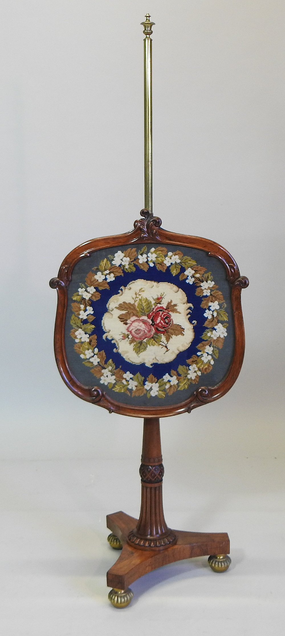 A late Regency rosewood needlepoint pole screen, on fluted column and a triform base, - Image 4 of 8