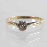 An 18 carat gold solitaire ring, the single old cut stone approx 0.