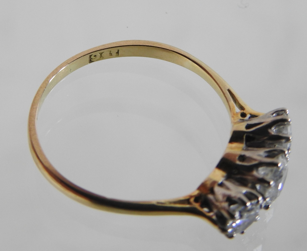 An 18 carat gold diamond three stone ring, approx 1. - Image 2 of 6