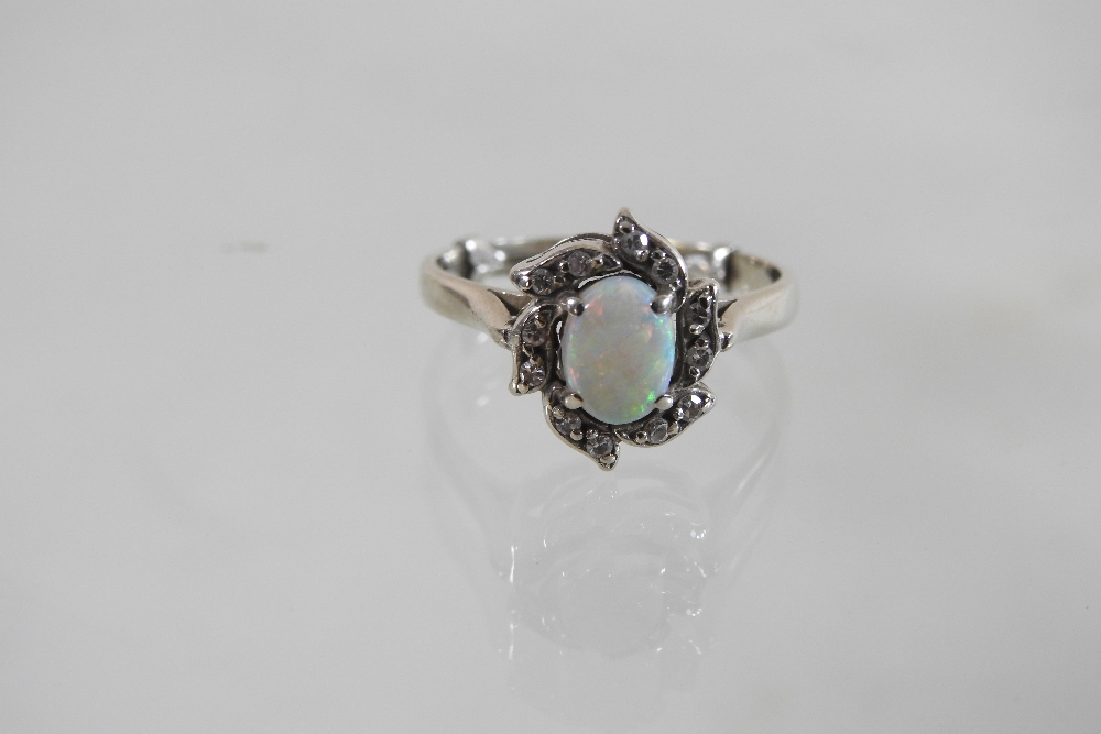 A 14 carat gold opal and diamond cluster ring, together with a cultured pearl single stand necklace, - Image 3 of 8