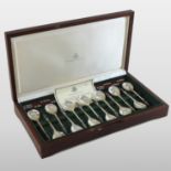 A set of thirteen silver apostle spoons, by The Birmingham Mint, 1977, each 14cm long,