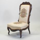 A Victorian rosewood and floral upholstered side chair, on cabriole legs,
