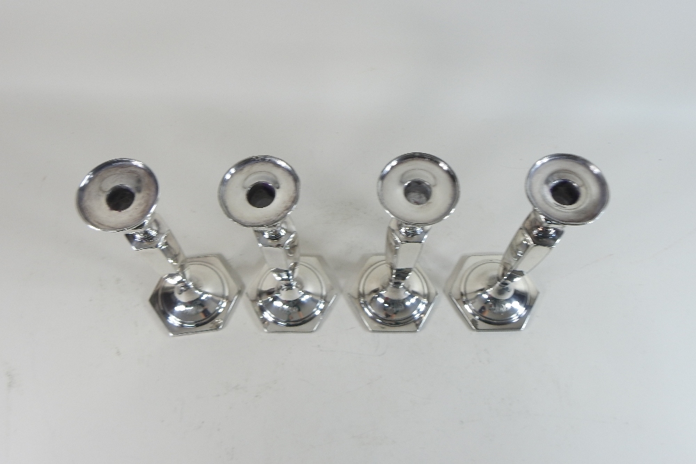 A set of four mid 20th century American silver plated table candlesticks, each of octagonal shape, - Image 6 of 9