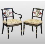 A set of twelve Regency style polychrome painted and ebonised dining chairs,