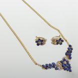 An 18 carat gold sapphire and diamond necklace and earring set,