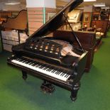 A 19th century ebonised cased baby grand piano, on octagonal turned legs, by Robert Westphall,